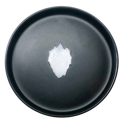 creamy and emolient texture of aroma bust care butter.