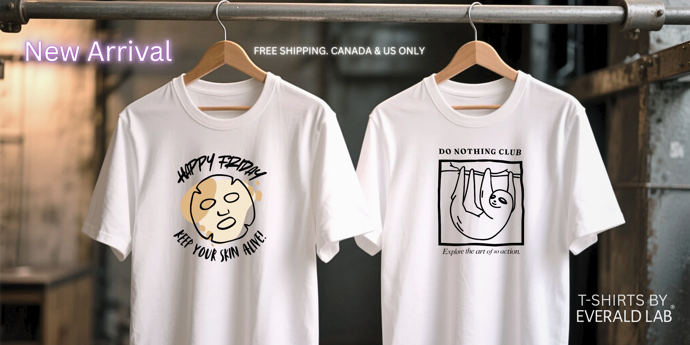 Two white t-shirts with graphic designs on hangers against a blurred background.