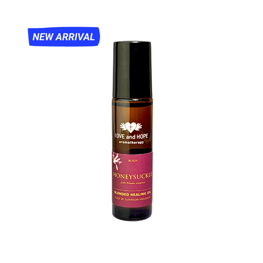 A roll-on bottle of Love and Hope Aromatherapy Honeysucker blended healing oil, shown on a plain white background with a blue 'NEW ARRIVAL' banner in the top left corner.