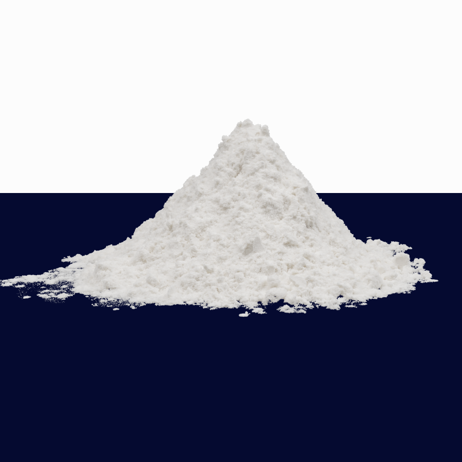 A mound of white powder centered on a split background, with the top half white and the bottom half dark navy blue.