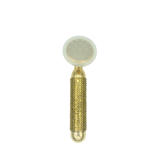 Pulsating facial massager used with a skin care product to help absorption.